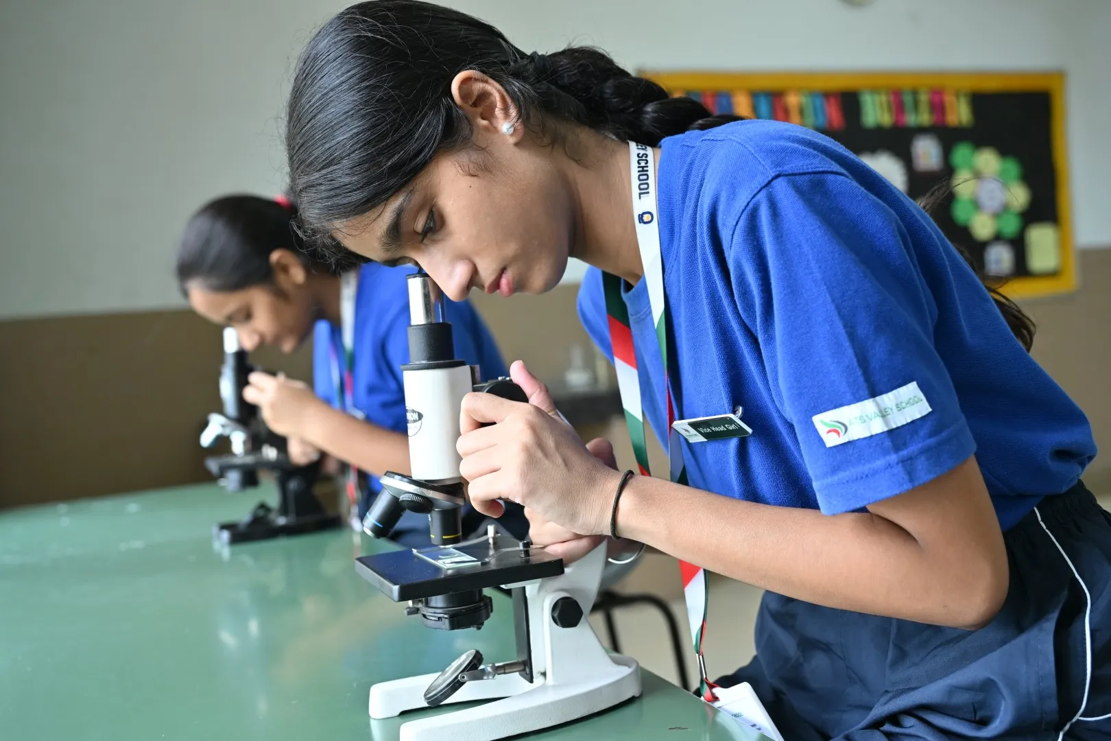 Students conducting science activities at ATS Valley School