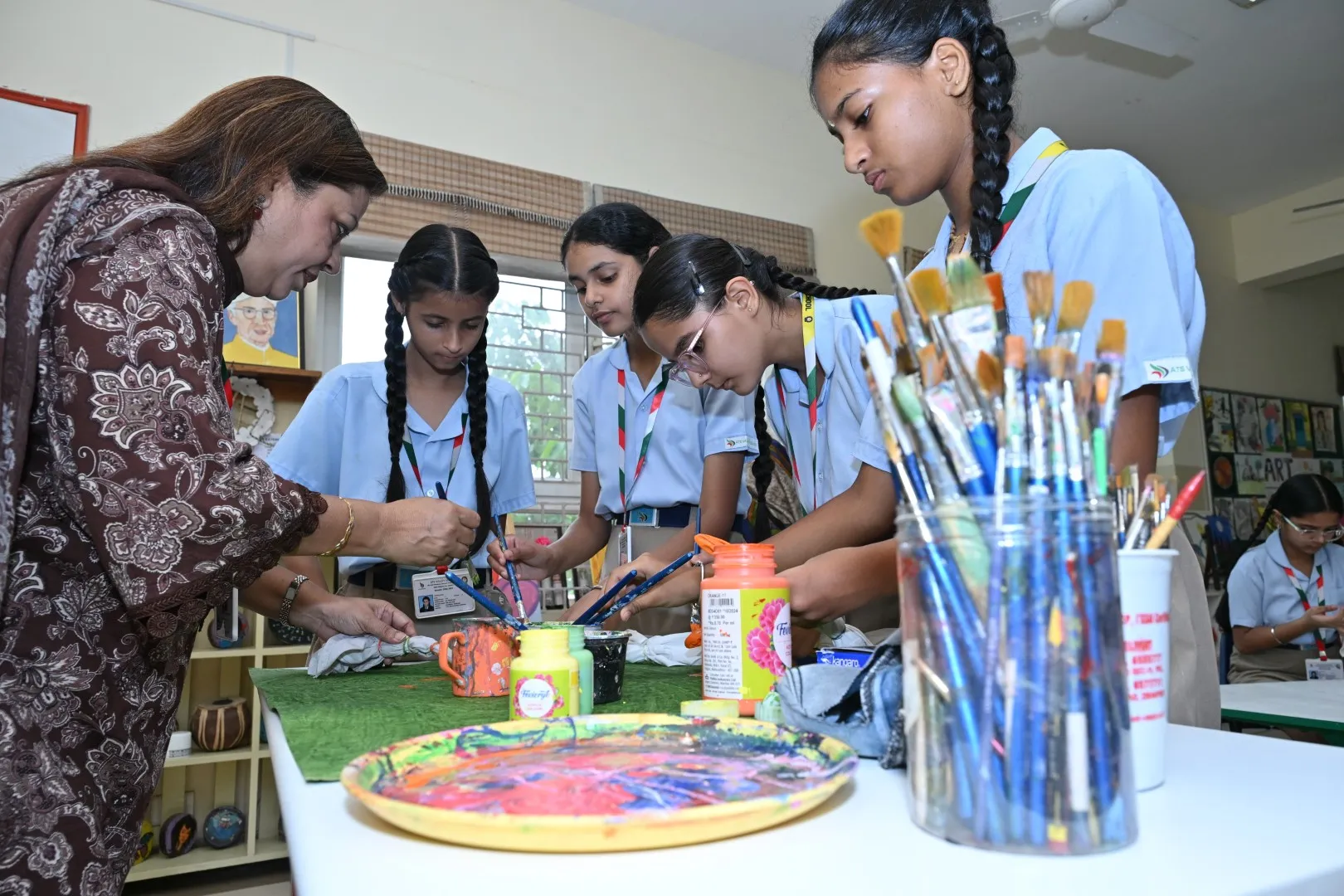 Students exploring creative arts at ATS Valley School