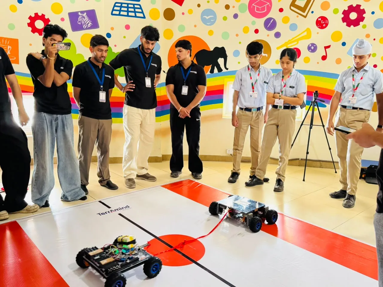 Students working with technology and robotics